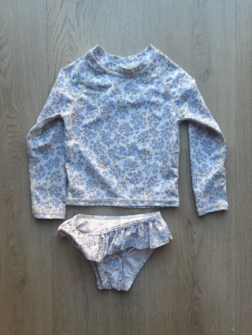 Rylee + Cru Blue and Cream Floral Long-Sleeve Rash Guard Swim Set